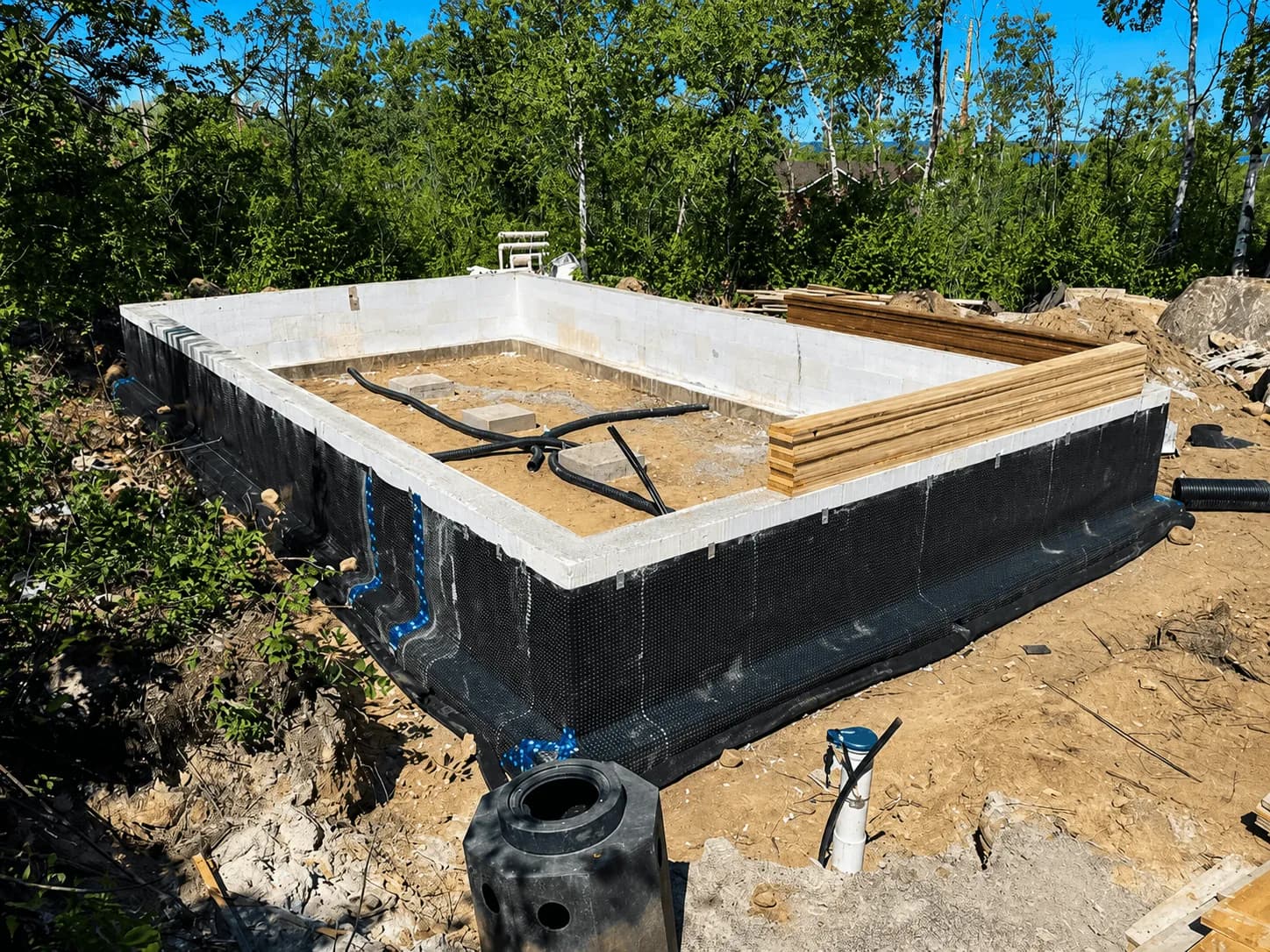 Spartan Builders ICF foundation waterproofing and drainage