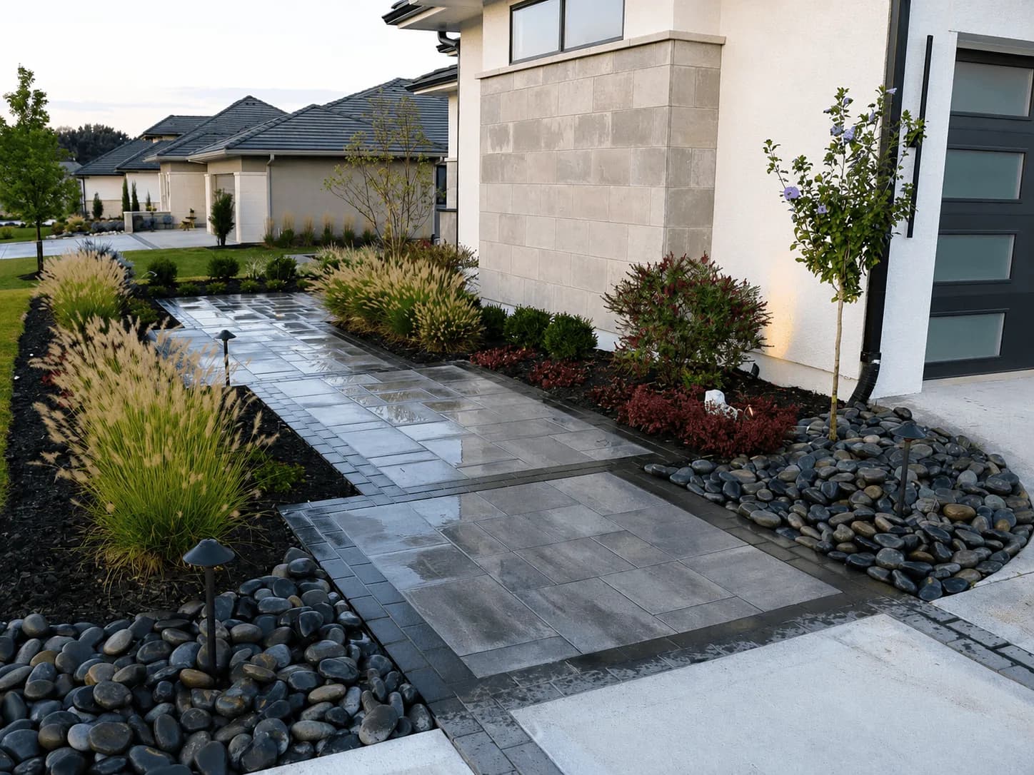 Front yard landscaping and walkway project by Spartan Builders